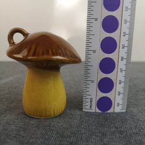 Mushrooms shaped salt or pepper shaker with a hang loop
